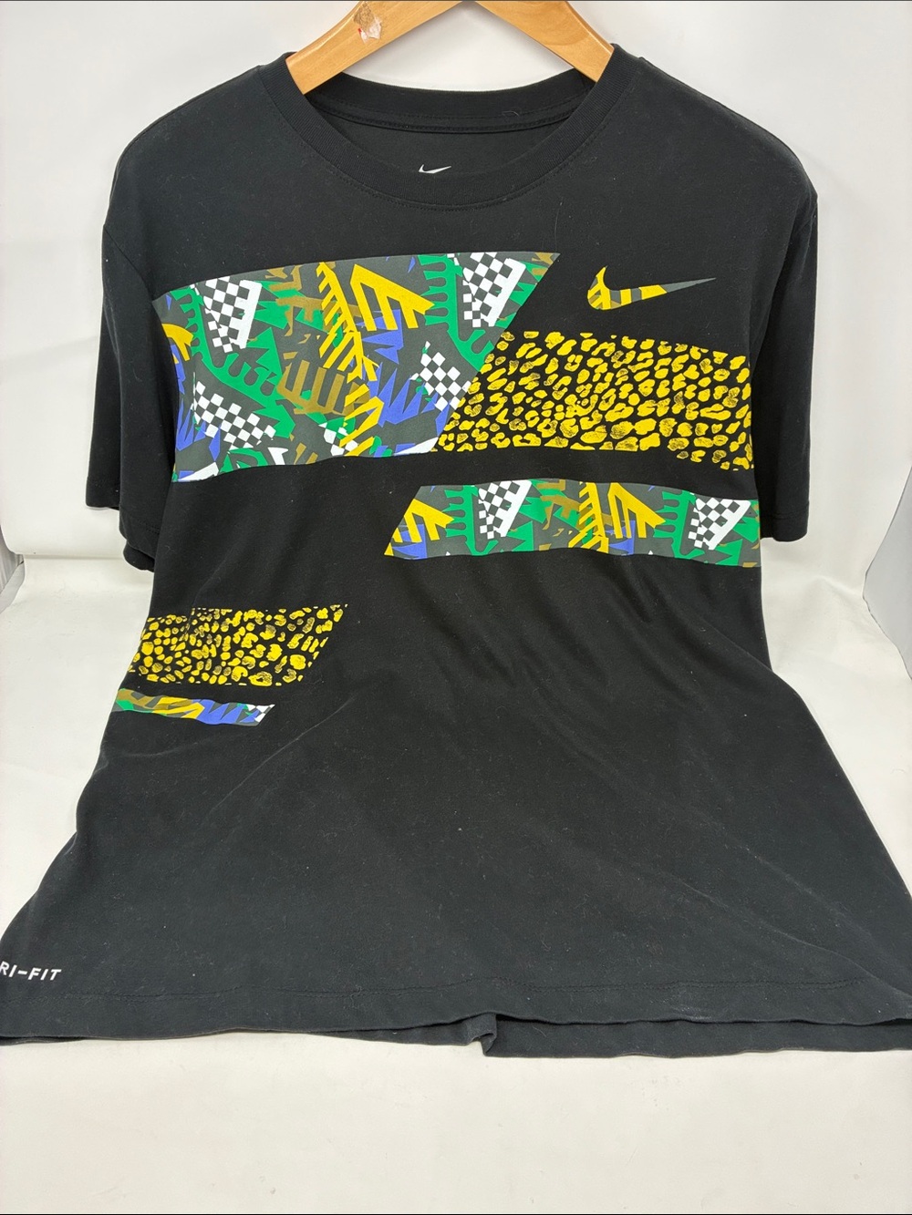 Nike Black Short Sleeve Graphic Dri-FIT Tee with Yellow, Green & Blue Accents